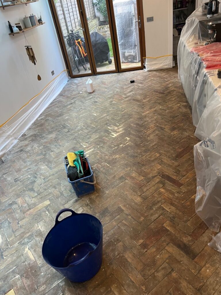 Badly Stained Brick Tiled Kitchen Floor Before Cleaning Barking